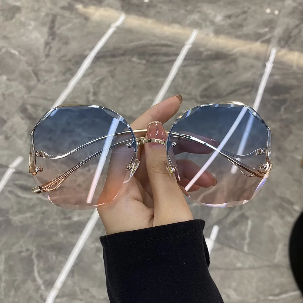 Trendy fashionable polygonal frameless cut edge sunglasses women's metal curved legs retro street photo sunglasses