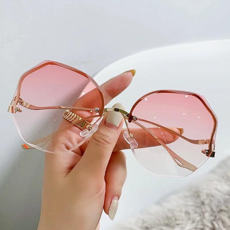 Trendy fashionable polygonal frameless cut edge sunglasses women's metal curved legs retro street photo sunglasses