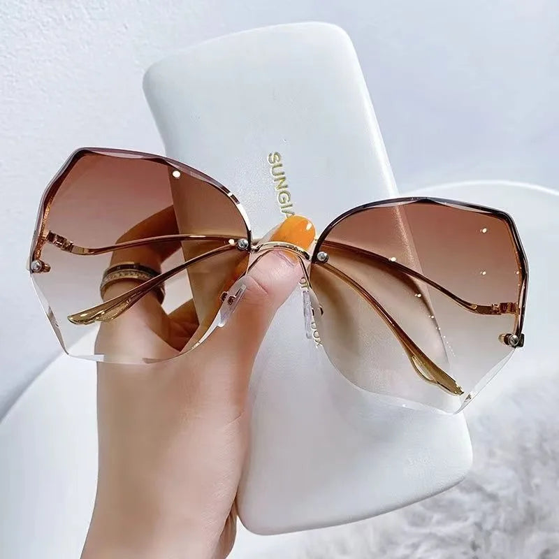 Trendy fashionable polygonal frameless cut edge sunglasses women's metal curved legs retro street photo sunglasses