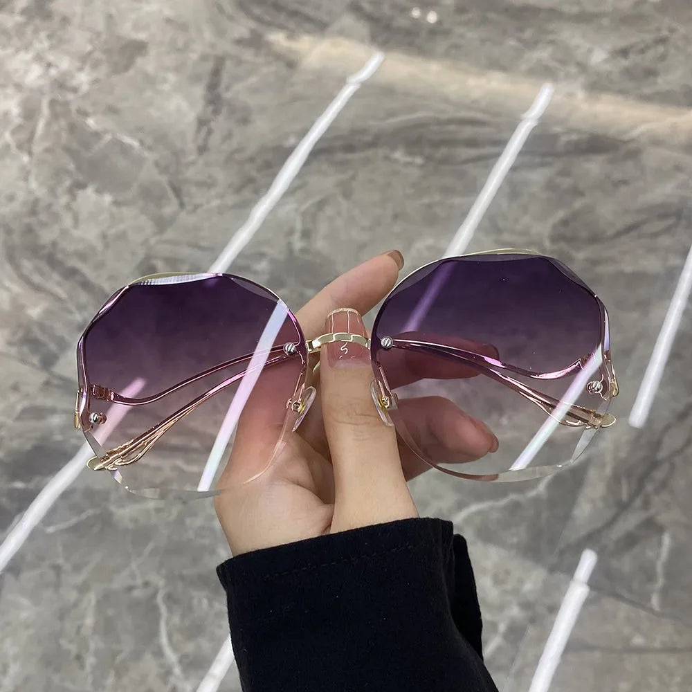 Trendy fashionable polygonal frameless cut edge sunglasses women's metal curved legs retro street photo sunglasses