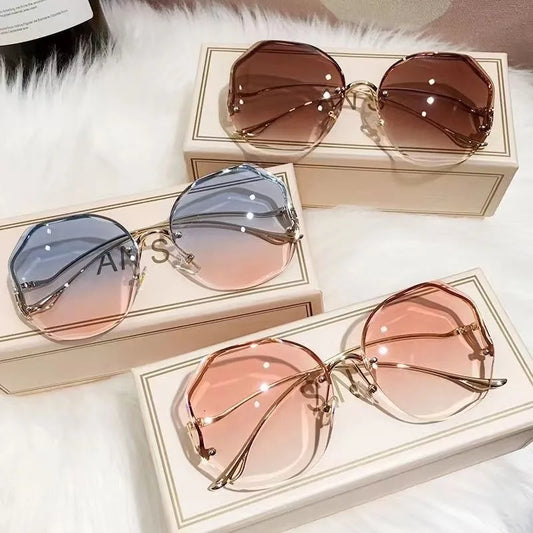 Trendy fashionable polygonal frameless cut edge sunglasses women's metal curved legs retro street photo sunglasses